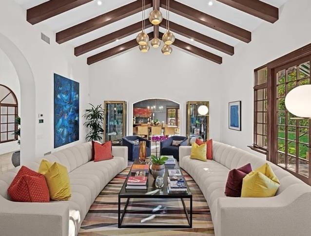 Grand living room with vaulted exposed beams